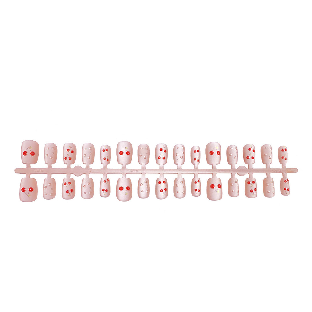 Artful nails with cherry motif Stornfield