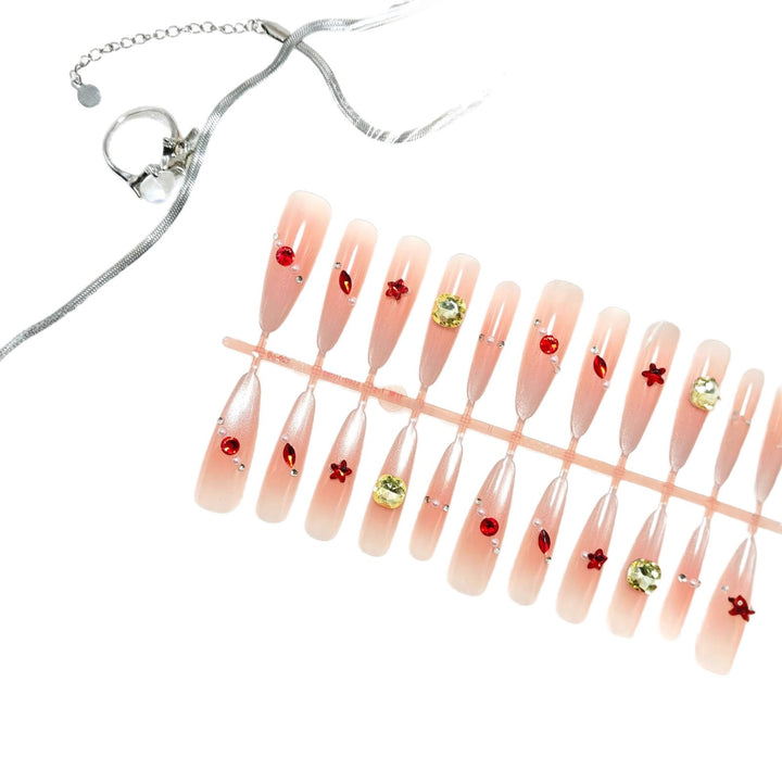 Artificial nails with sparkling 3D decorations Stornfield