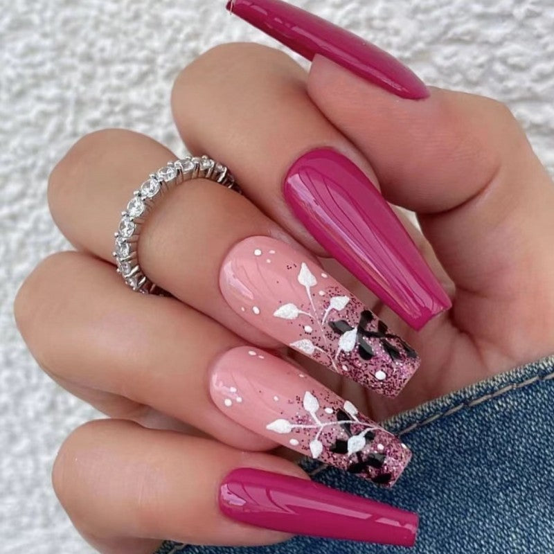 Artificial nails with floral and glittering accent Stornfield