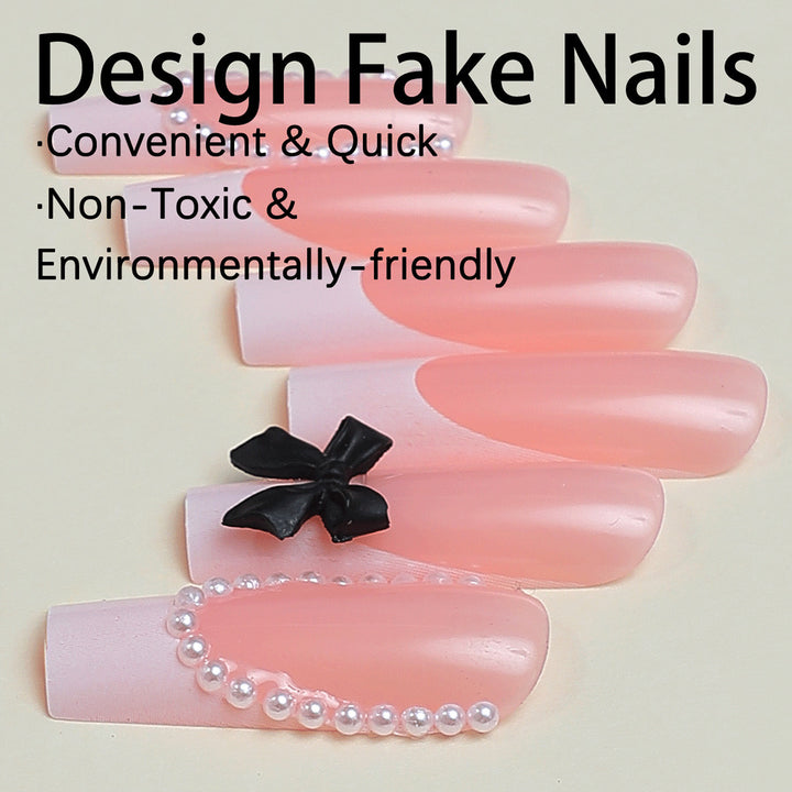 Artificial nail set with elegant rhinestone and bow decorations Stornfield