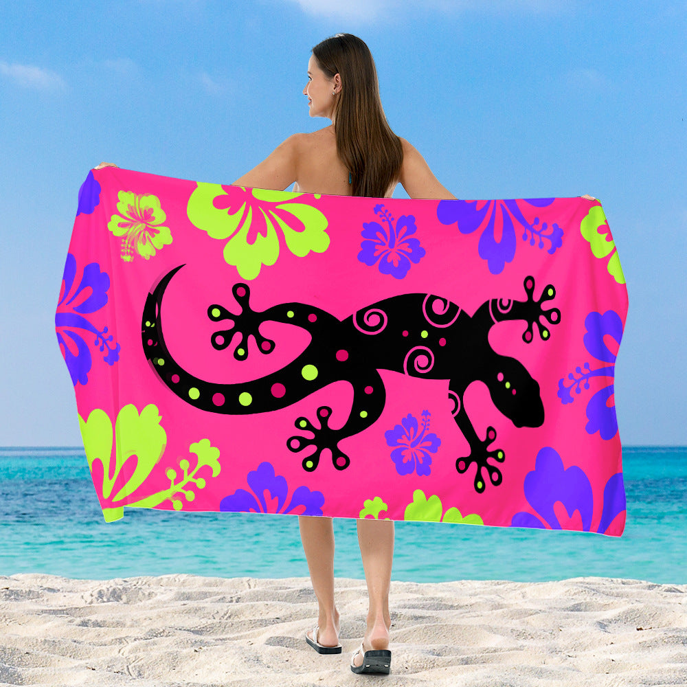 Beach towel with vibrant, colorful animal motif Stornfield