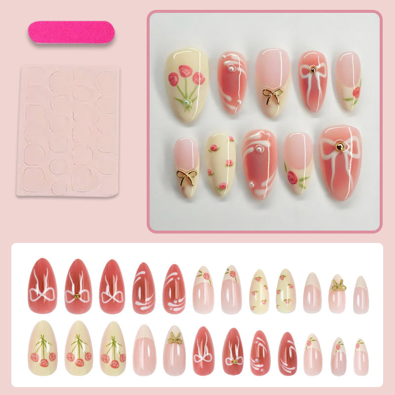 Artificial nail set with floral accents and elegant glitter Stornfield