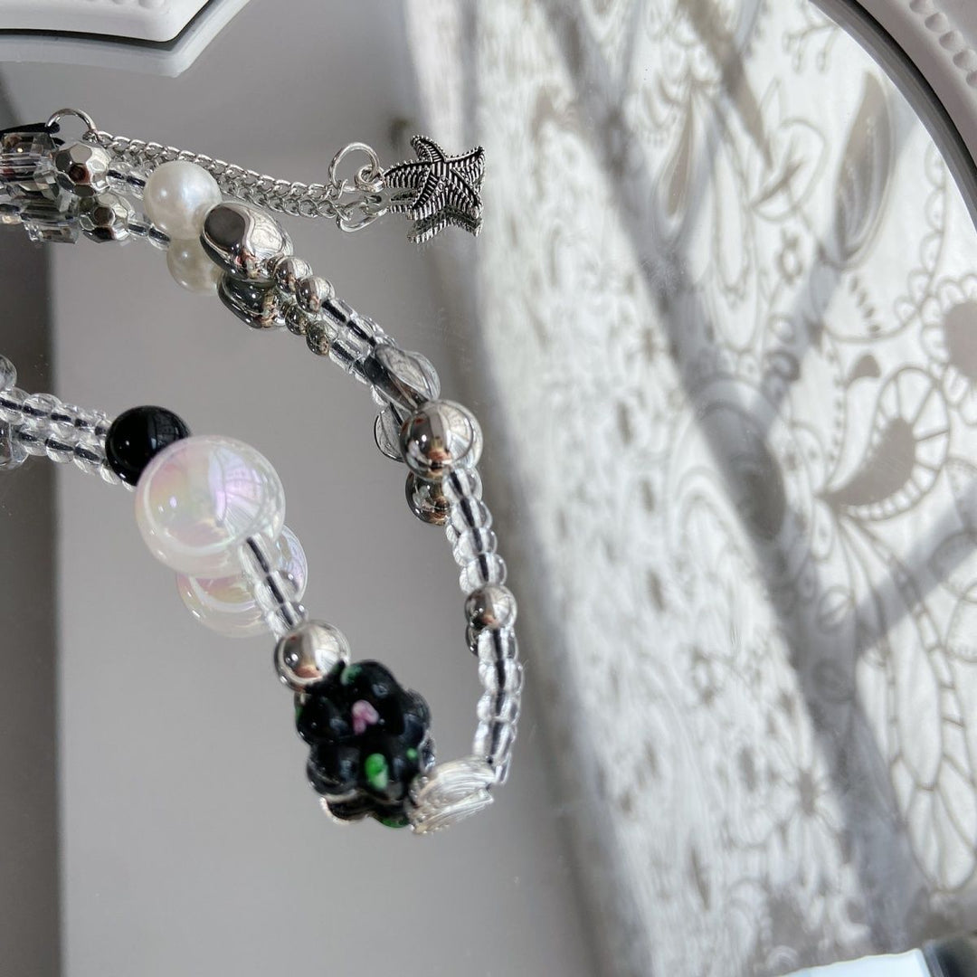 Elegant Beaded Charm Eyewear Holder Stornfield