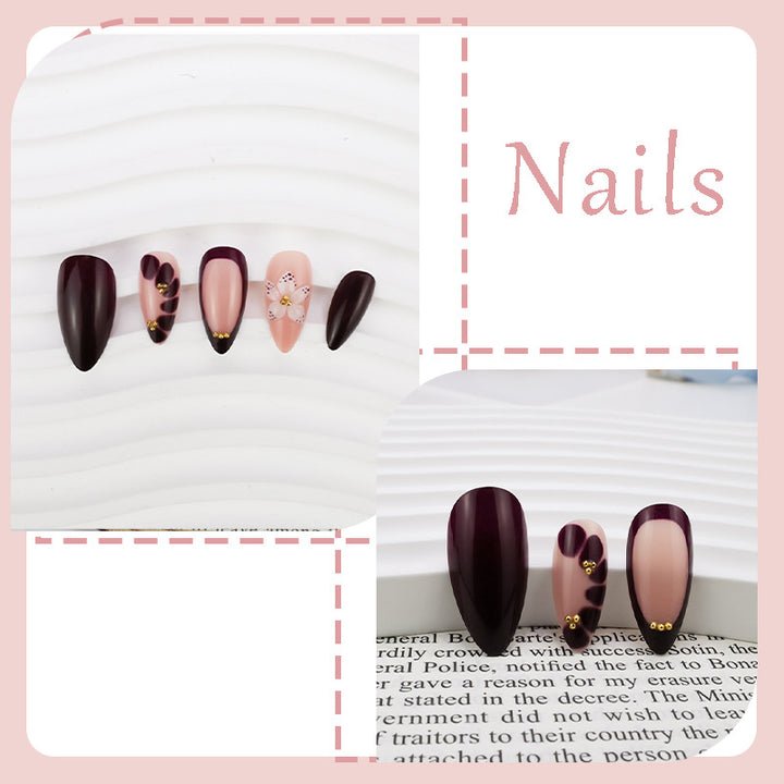 Acrylic nail set with elegant floral patterns and glamour accents Stornfield