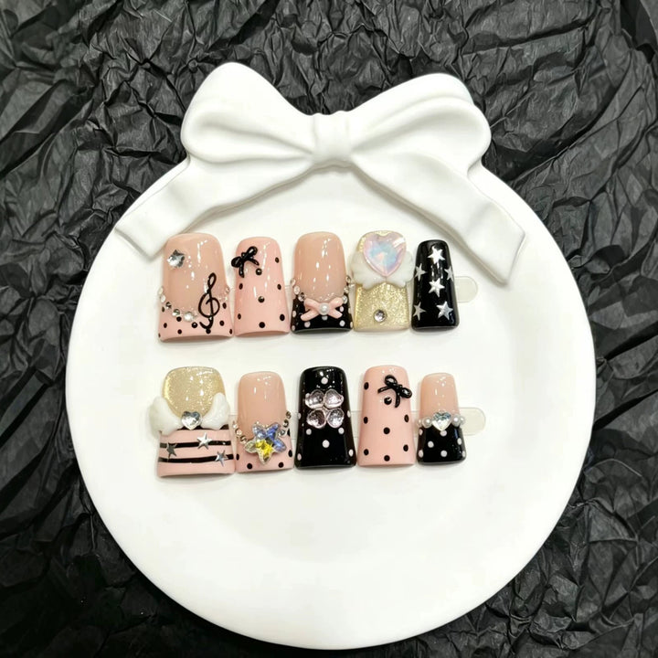 Decorative Press-On Nail Art Set with Unique Charms