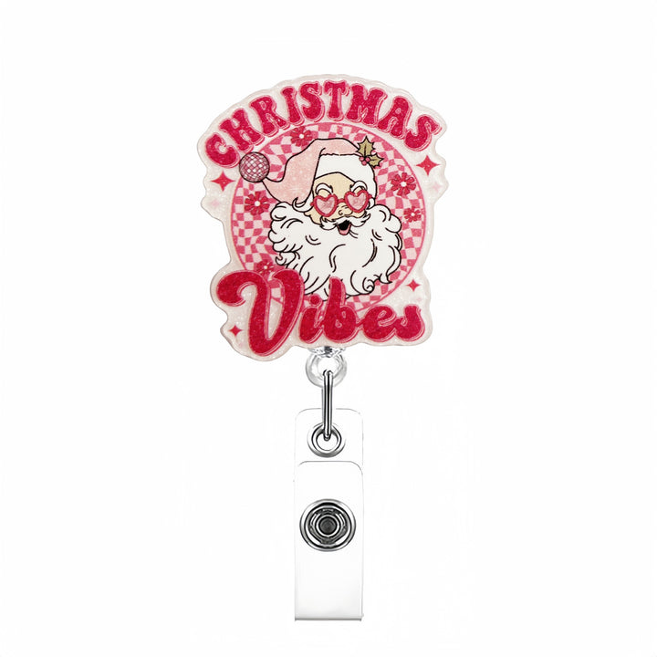 Expandable badge holder with anatomical heart pendant