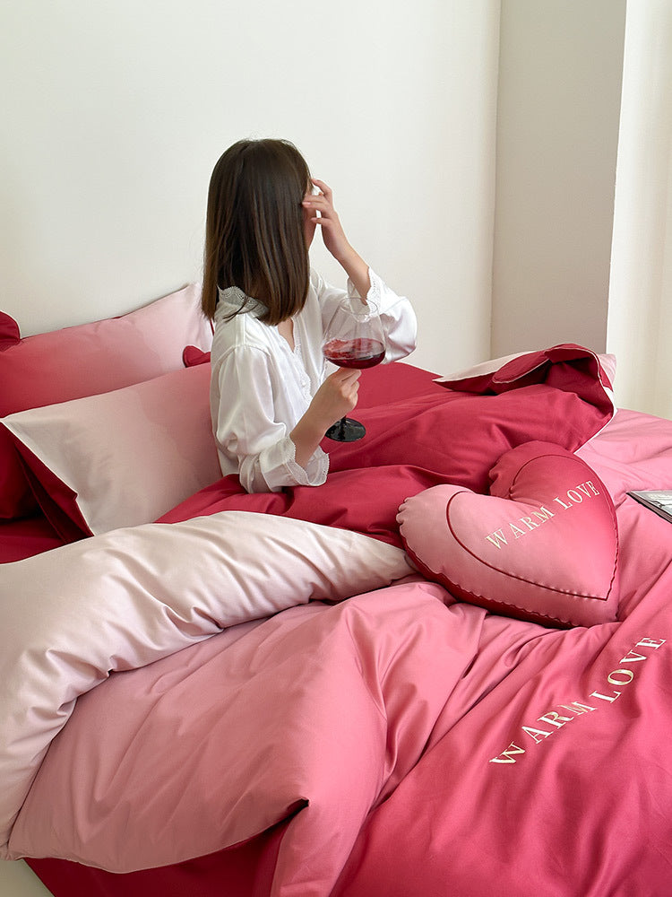 Luxurious satin bedding set with heart pillow and reversible function