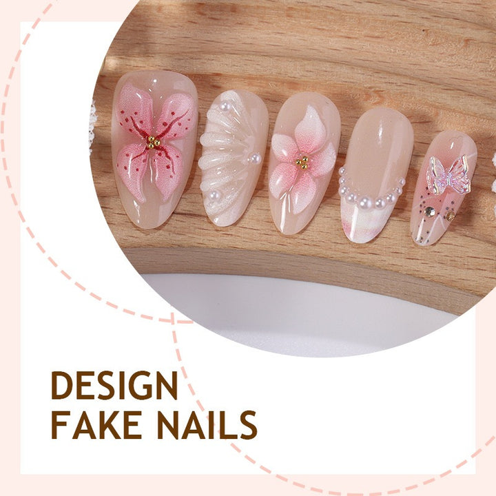 Creative nail art set with delicate flower and glitter embellishments Stornfield