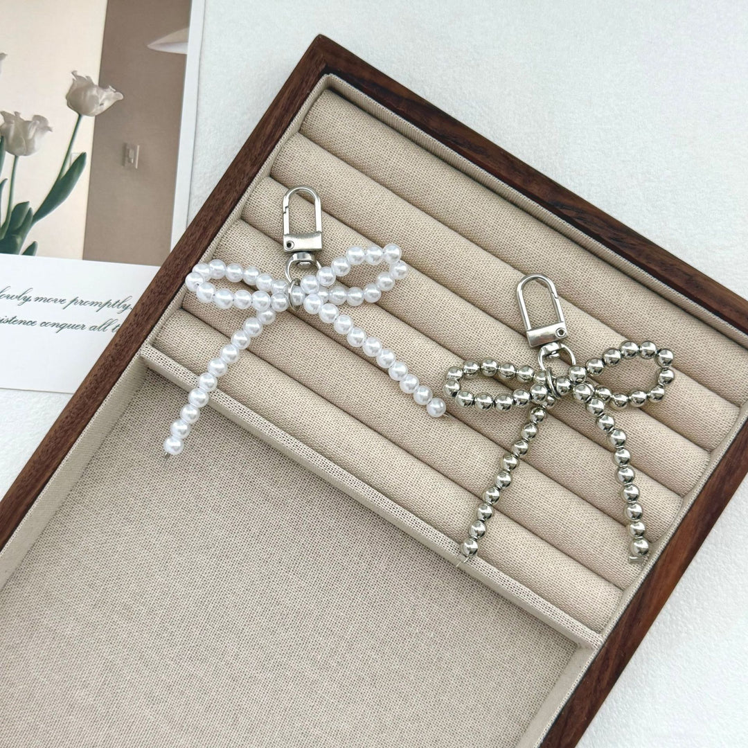 Elegant Pearl Bow Keychain Stornfield
