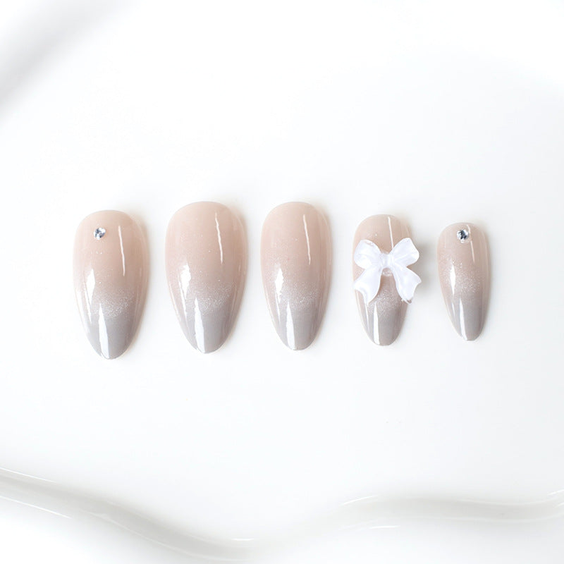 Elegant Rhinestone and Bow Nail Art Extensions Stornfield