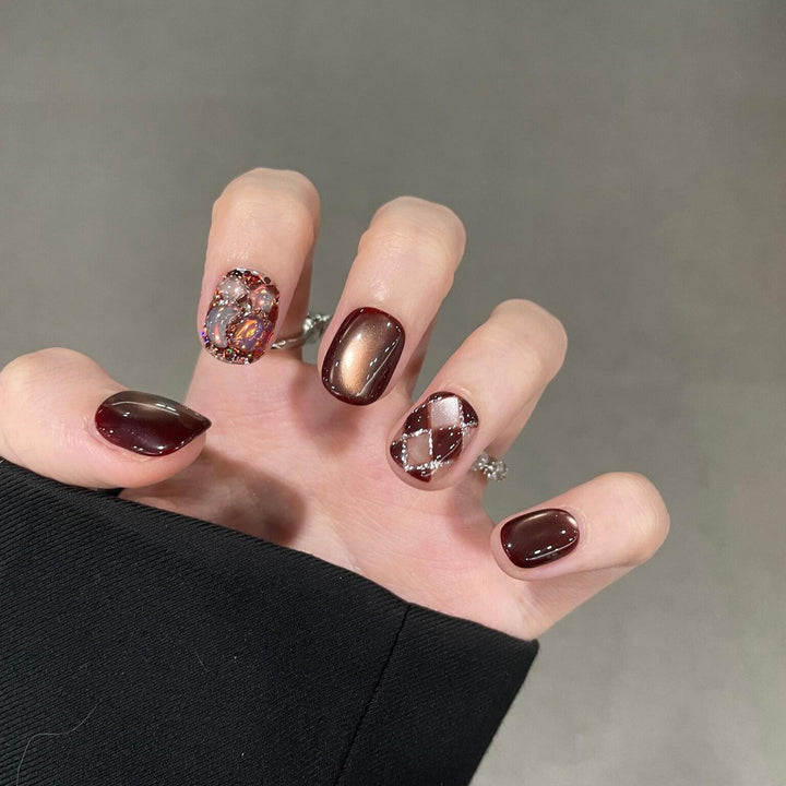 Artificial nails with creative rhinestone design Stornfield