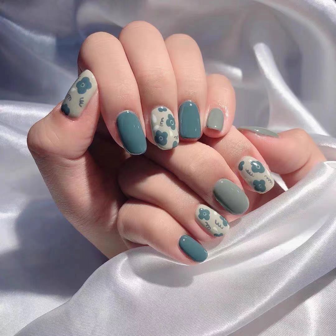 Stylish art nails with floral accents Stornfield