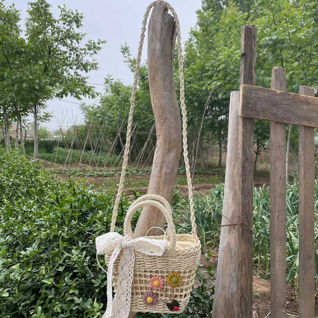 Playful basket bag with floral accents Stornfield