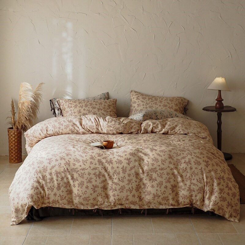 Finely woven cotton bedding set with delicate floral print and decorative ties