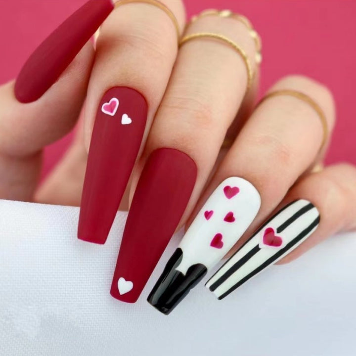 Artificail nails with creative heart design Stornfield