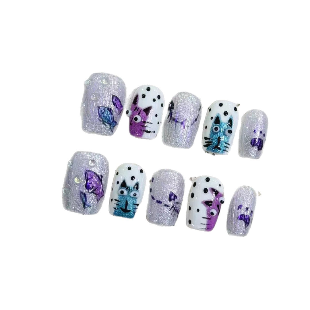 Artistic Press-On Nail Art Set with Unique Whimsical Designs