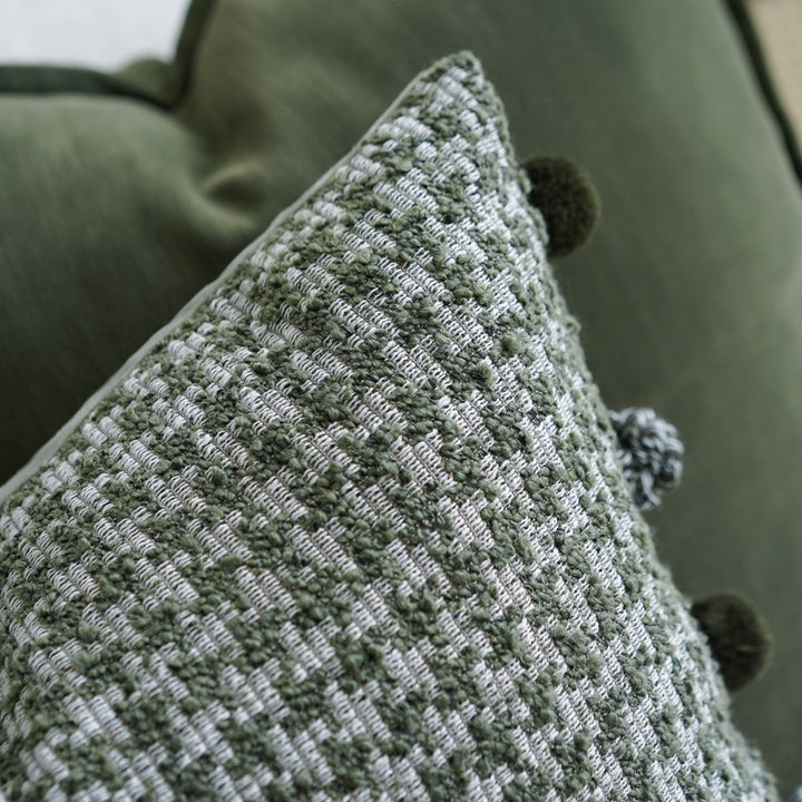 Decorative cushion with textured fabric