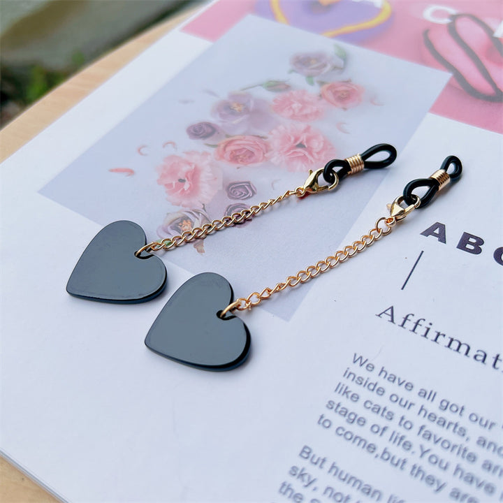 Heart-Shaped Dangle Earrings with Golden Chain Stornfield