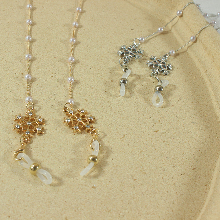 Elegant glasses holder chain with pearls and snowflake pendant Stornfield