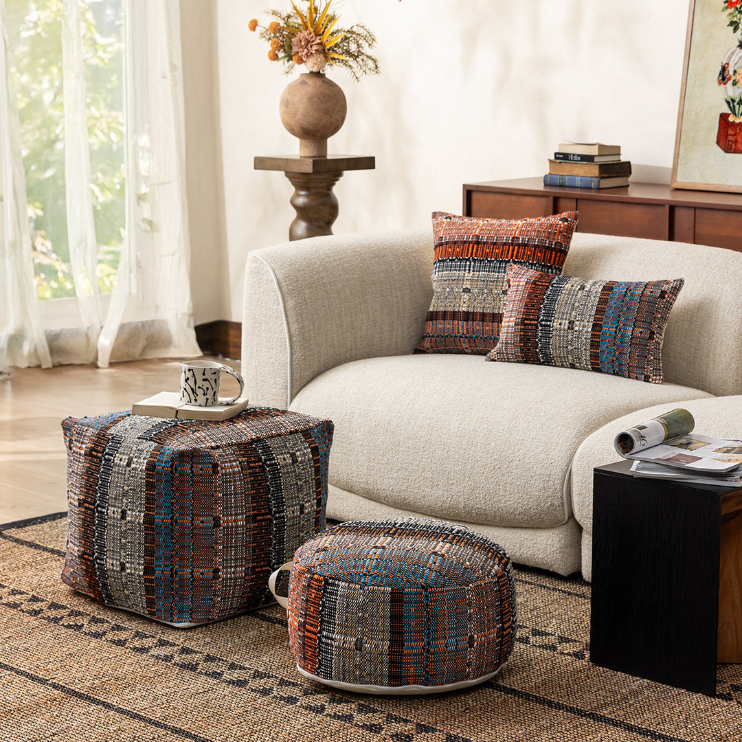 Round woven seat pouf made of durable cotton mix with practical carrying handle Stornfield