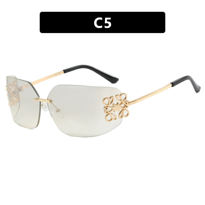 Ladies extravagantly designed sunglasses with elegant embellishments Stornfield