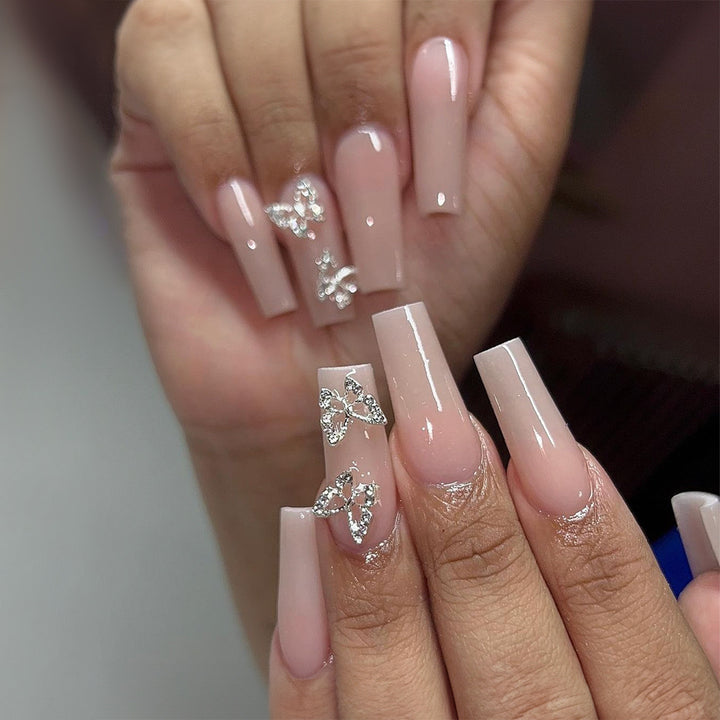 Artificial nails with butterfly accents and rhinestone decorations Stornfield