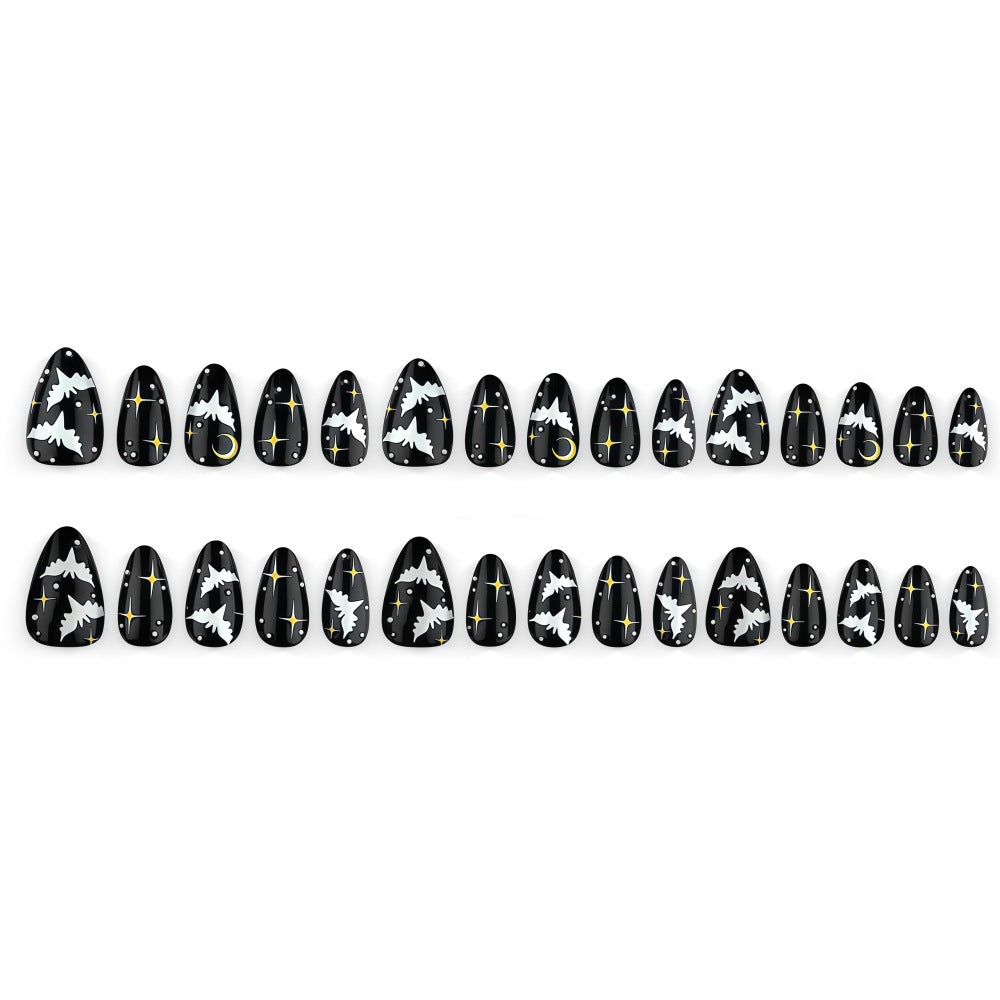 Artificial nails in creative Halloween bat design Stornfield