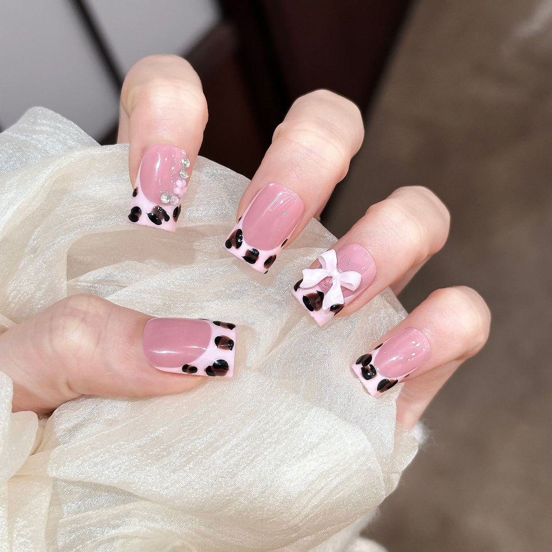 Decorative Press-On Nail Set with Unique Bow and Gem Accents