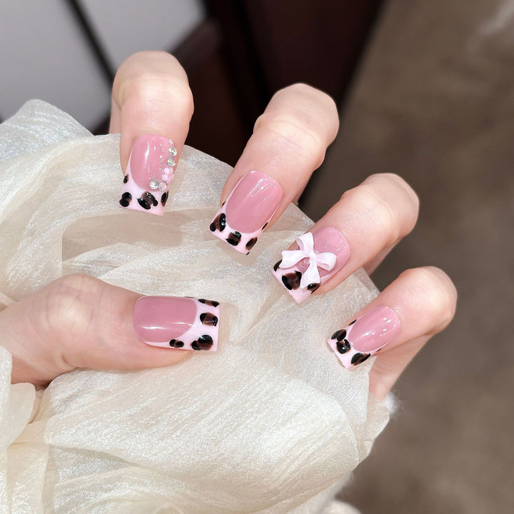 Decorative Press-On Nail Set with Unique Bow and Gem Accents
