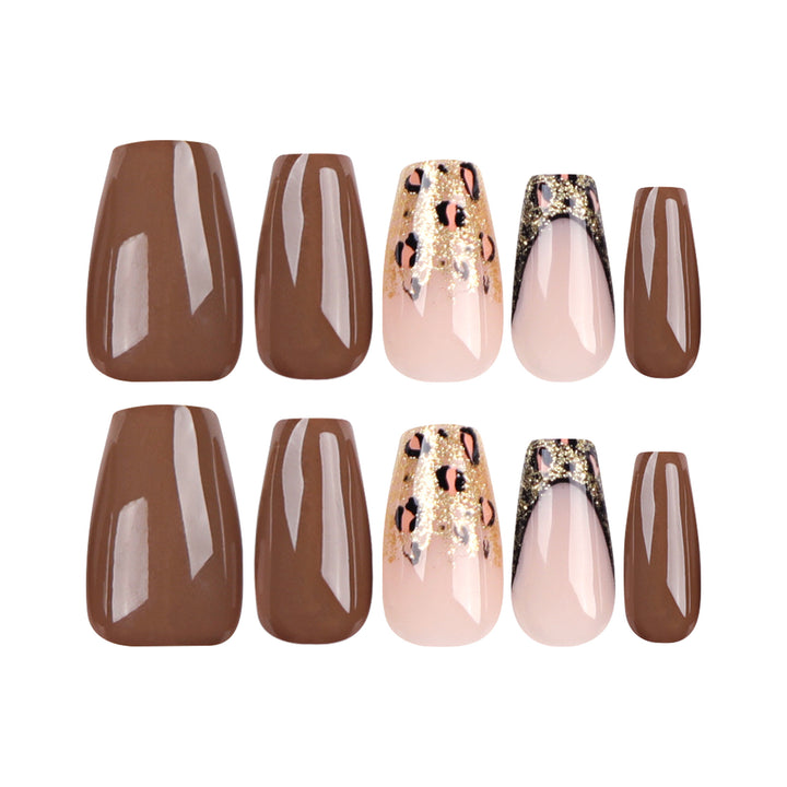 Glamorous acrylic nails with glitter and leopard designs Stornfield