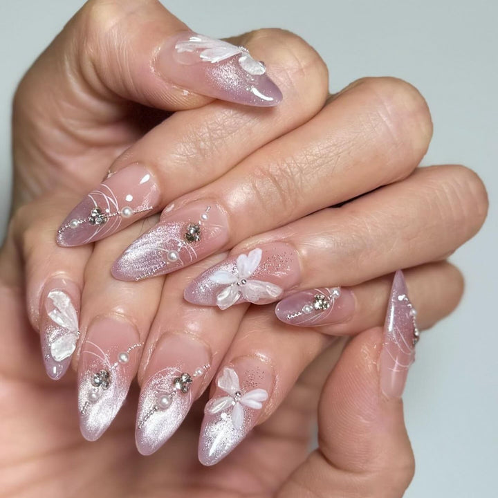 Artful Nail Extensions with Delicate Flower Designs Stornfield