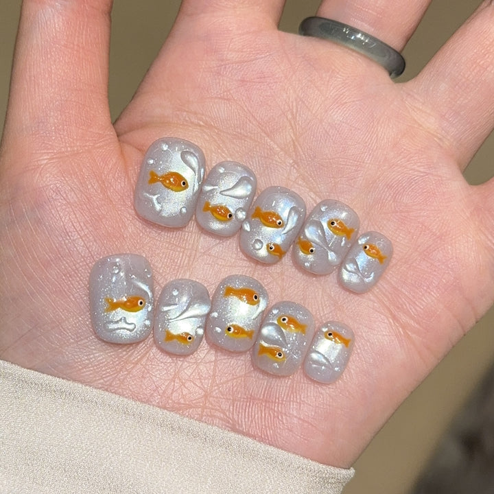 Artificial nails with goldfish design Stornfield
