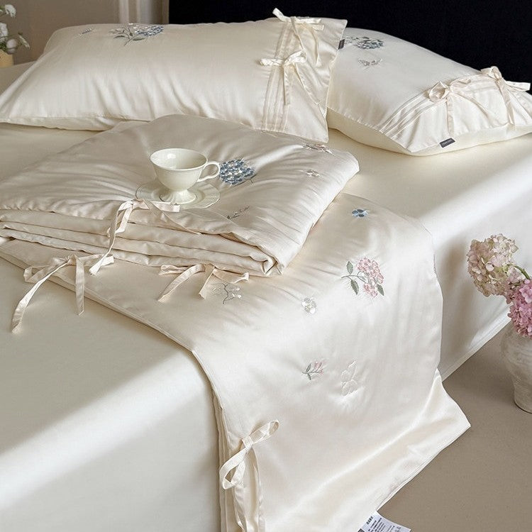 Embroidered satin bedspread set with ties and silky-glossy surface