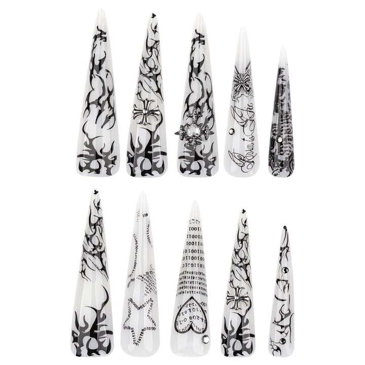 Artful stiletto nails with gothic pattern and embellishments Stornfield