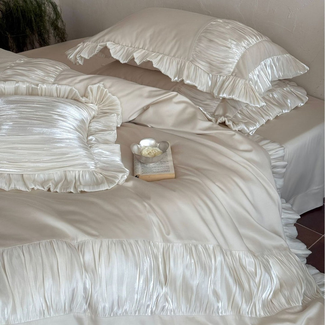 Romantic satin bedding set with ruffles and pleated inserts