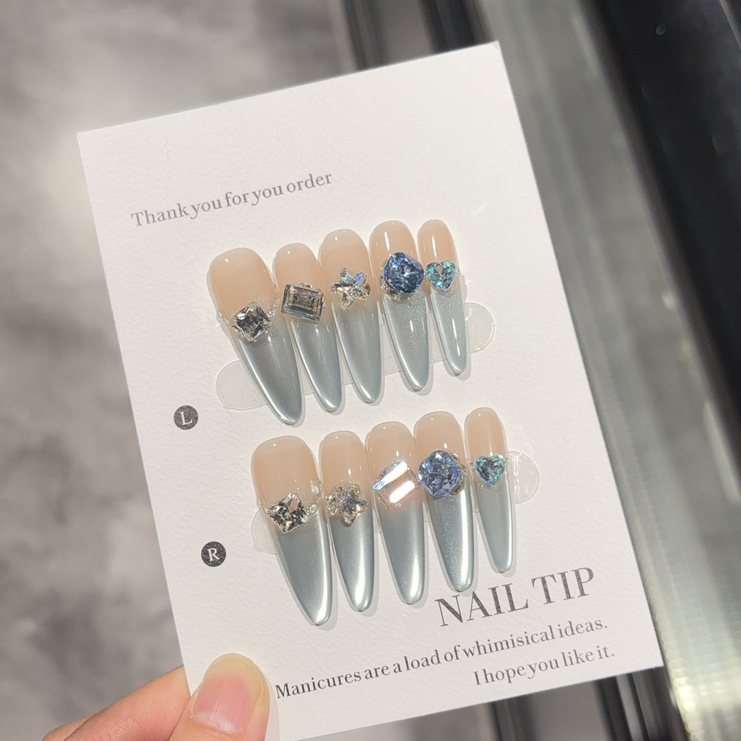 Glamorous artificial nails with sparkling stones Stornfield