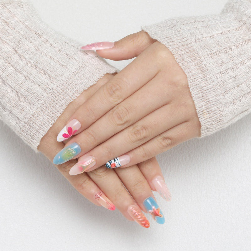 Artistic nail tips with maritime motifs Stornfield