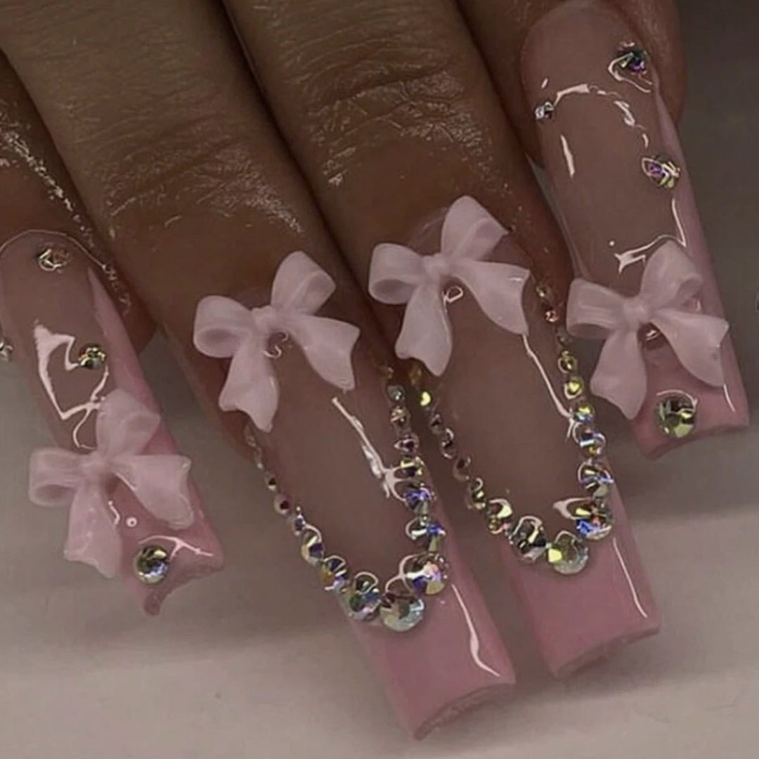 Nail art set with delicate arch decorations and rhinestone details Stornfield