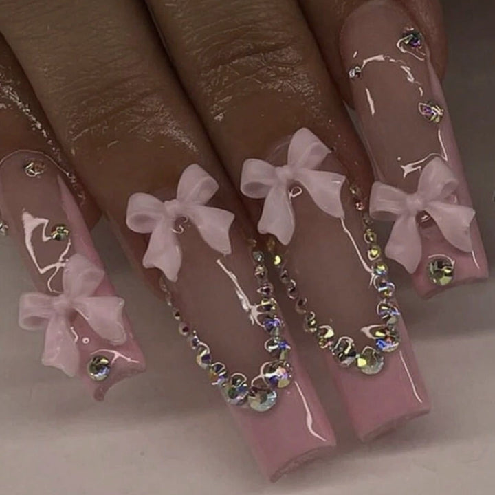 Nail art set with delicate arch decorations and rhinestone details Stornfield
