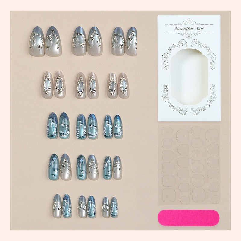 Nail art set with luxurious patterns and elegant embellishments Stornfield