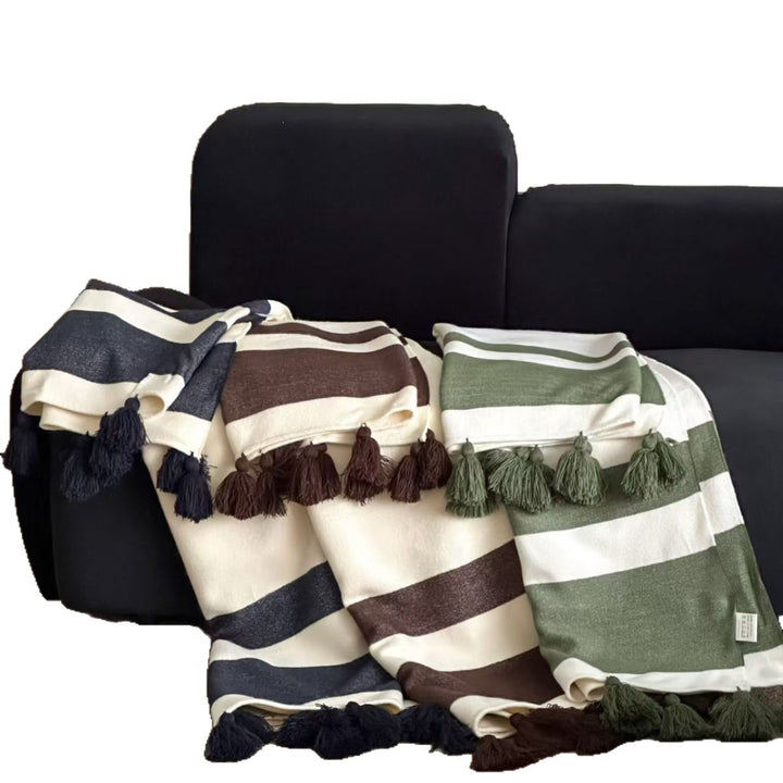 Soft woven blanket with tassels and diagonal stripes