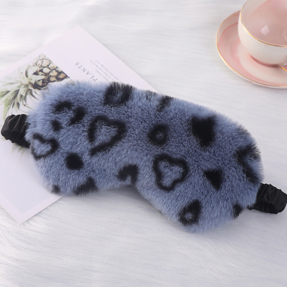 Women's cuddly faux fur sleep mask with heart-embossed surface and gathered comfort band Stornfield