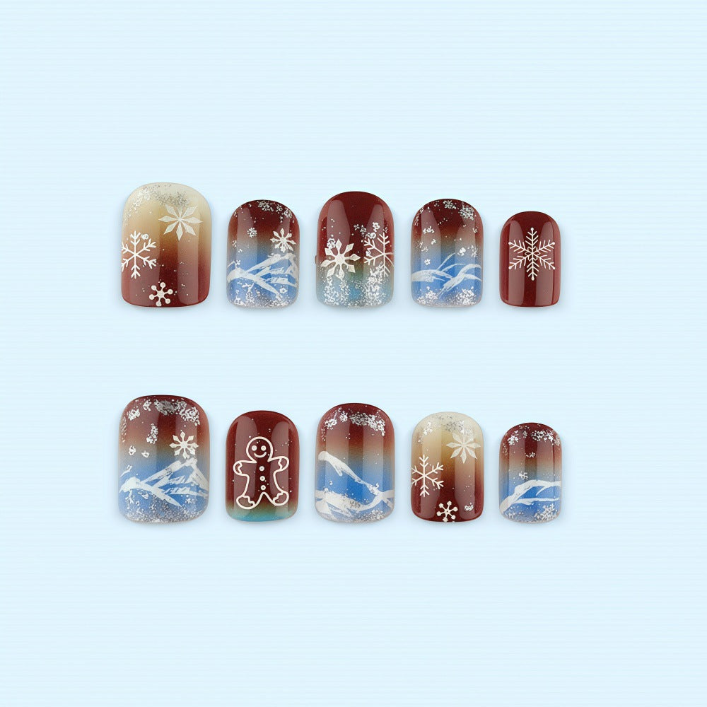 Artificial nails with festive snowflake and gingerbread motif Stornfield