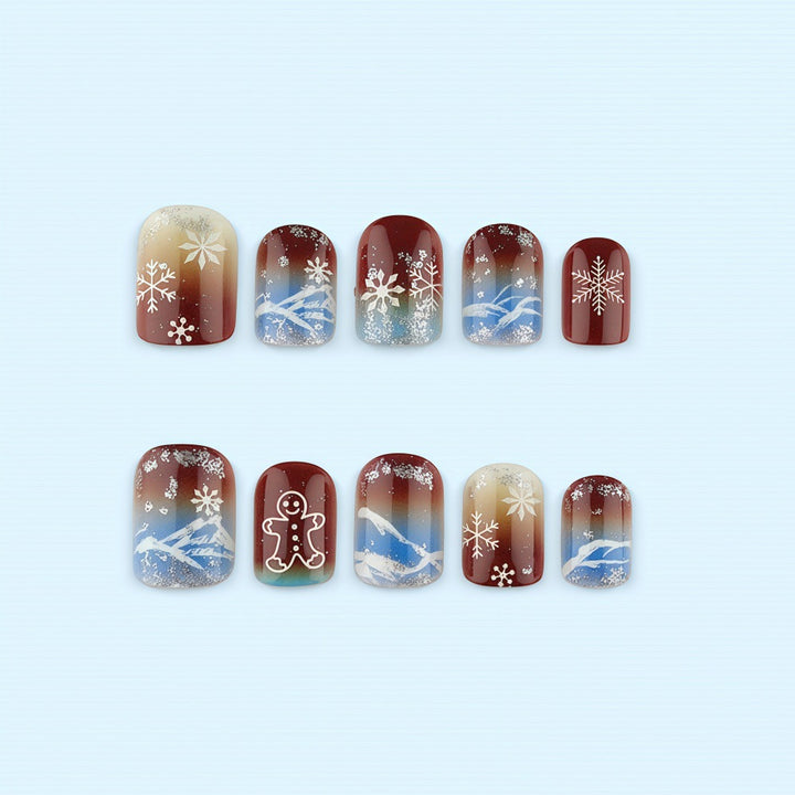 Artificial nails with festive snowflake and gingerbread motif Stornfield