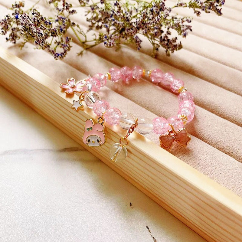 Elegant bracelet with animal and glitter pendants Stornfield
