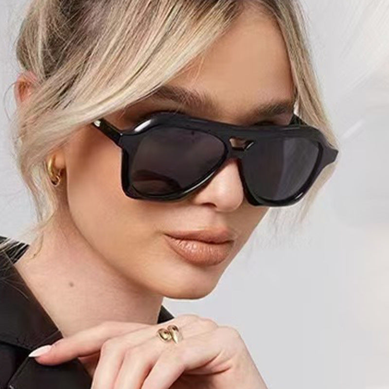 Ladies fashionable sunglasses in innovative design with wide frame Stornfield