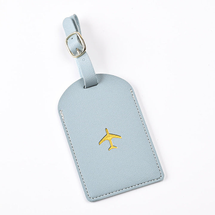 premium leather luggage tag with adjustable buckle strap and embossed airplane Stornfield