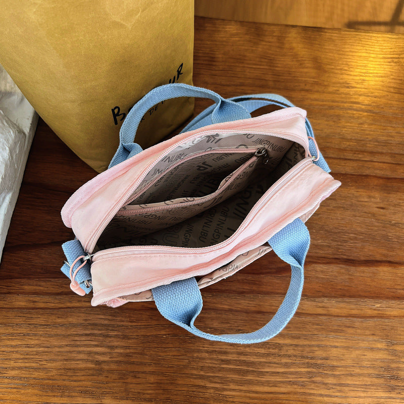 Tote bag with adjustable shoulder strap and extra storage Stornfield