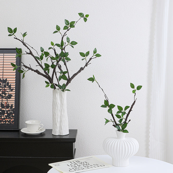 Decorative artificial tree branch with realistic leaves