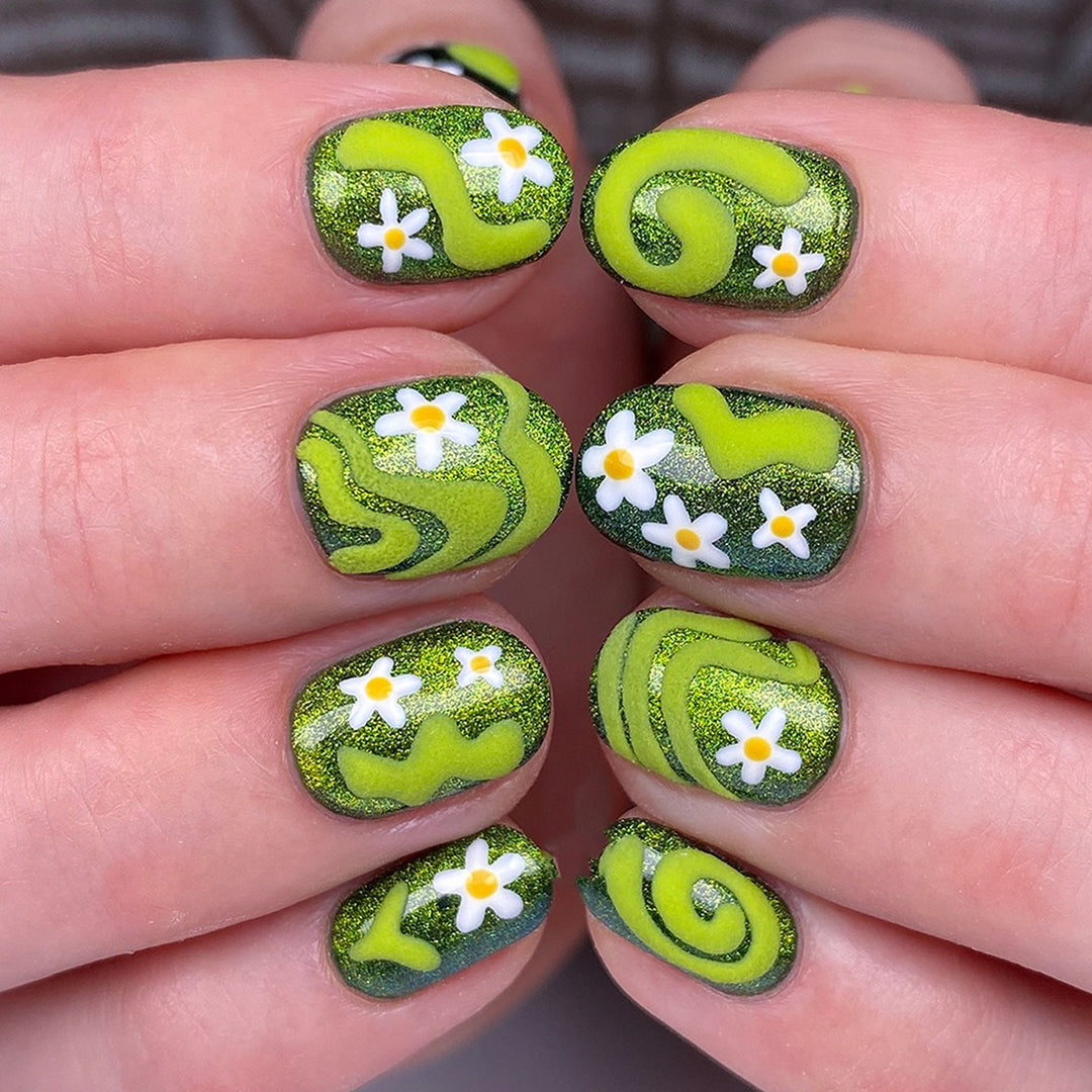 Artificial nails with floral and glittering accents Stornfield